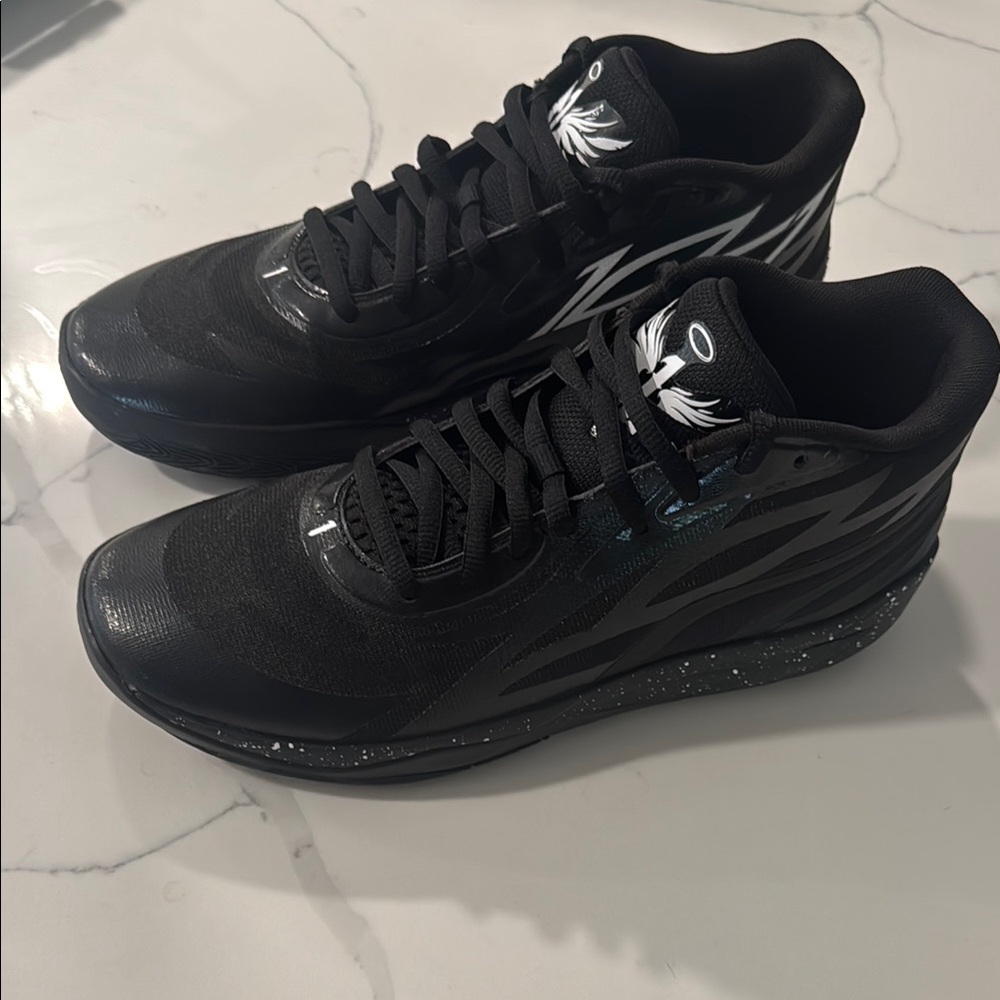 M.E.L.O Puma basketball sneakers.